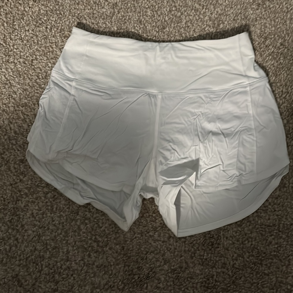 Gently worn white Lululemon shorts